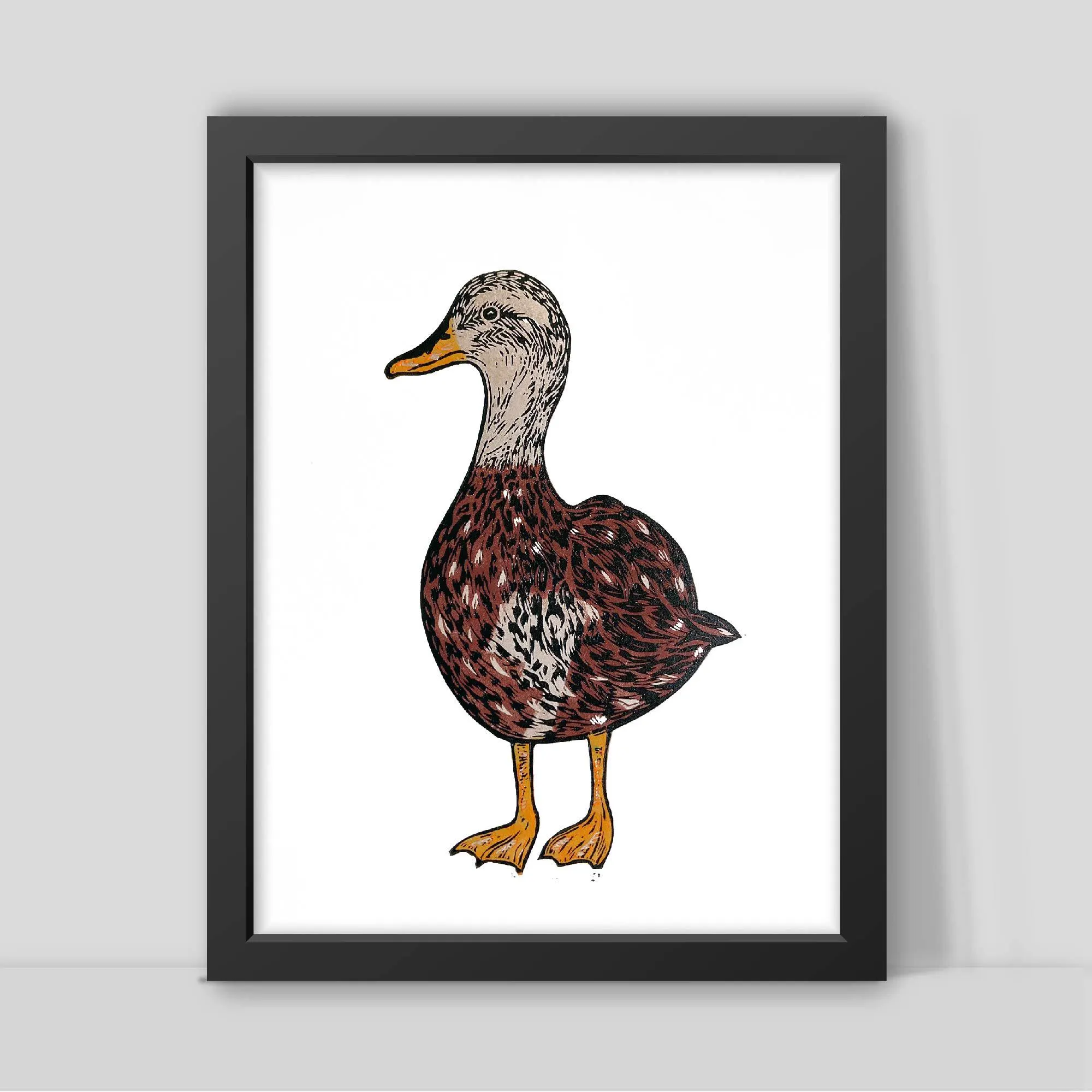 Framed illustration of a duck on a white background by Joanna Williams Art - lino printer.