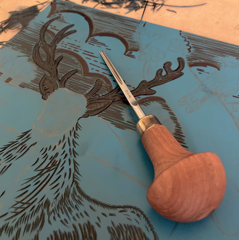 lino print process stage two of Joanna Williams' Art linocut process - transferring lino print design to the lino block and carving the design out