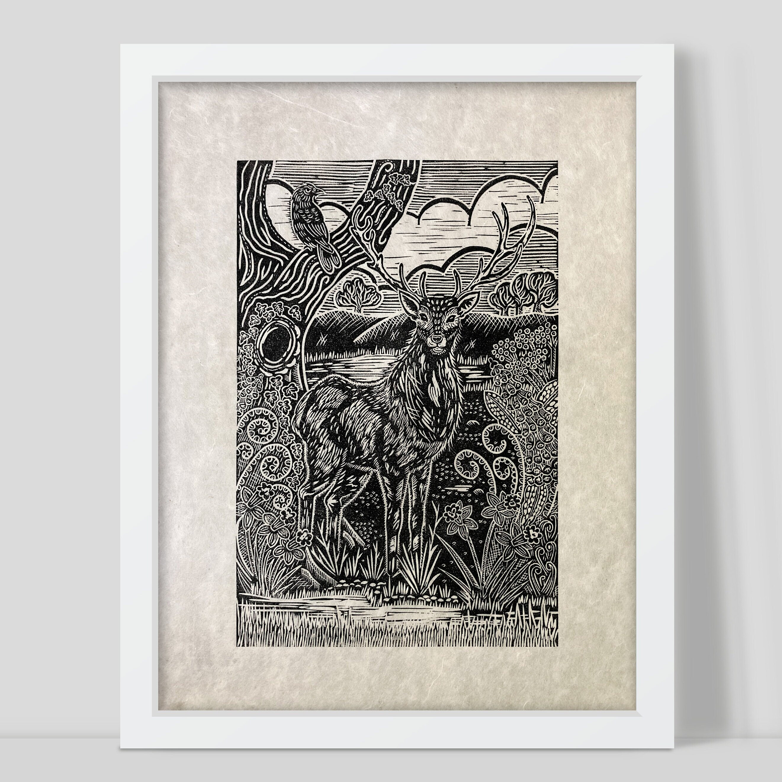 Framed black and white illustration of a deer with intricate patterns on a textured beige background by Joanna Williams Art - lino printer